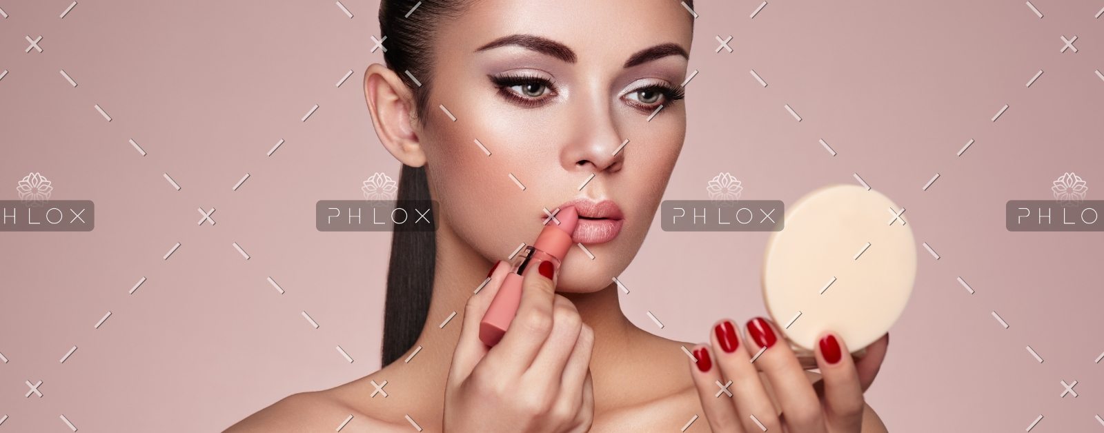 demo-attachment-1165-beautiful-woman-paints-lips-with-lipstick-PMB6YWP-1